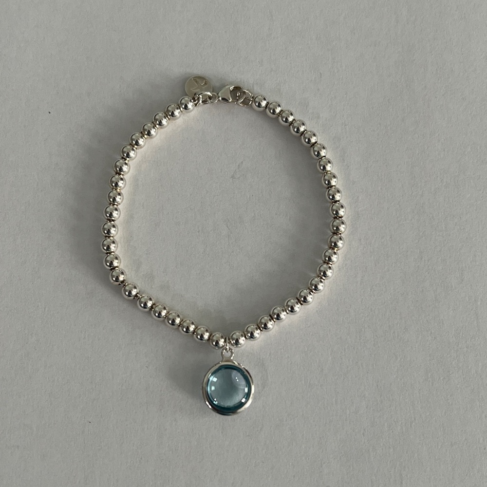 Tiffany & Co. Silver Bracelet with Blue Charm